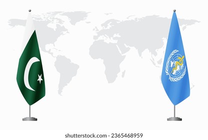 Pakistan and World Health Organization flags for official meeting against background of world map.