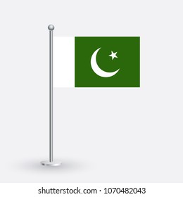 Pakistani flag. The national flag of Pakistani on a pole. The waving flag. The sign and symbol of the country. Realistic vector on white.