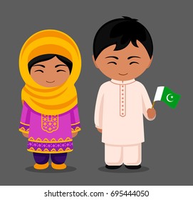Pakistanis in national dress with a flag. Man and woman in traditional costume. Travel to Pakistan. People. Vector flat illustration.