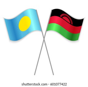 Palauan and Malawian crossed flags. Palau combined with Malawi isolated on white. Language learning, international business or travel concept.