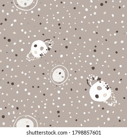 Pale simple cosmic seamless pattern with stars and planets. Dotted pastel beige background. Galaxy theme. Great for wallpaper, textile, wrapping paper, fabric print. Vector illustration.