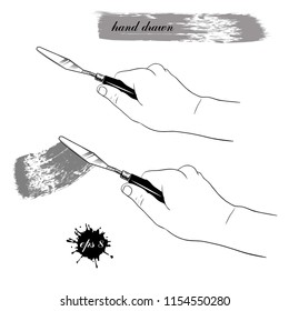 Palette knife in the hand. Vector Set of two sketches.
 Hand-drawn illustration.Isolated objects on white background