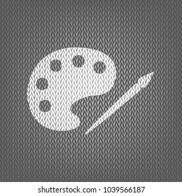 Palette and paint brush sign. Vector. White knitted icon on gray knitted background. Isolated.