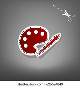 Palette and paint brush sign. Vector. Red icon with for applique from paper with shadow on gray background with scissors.