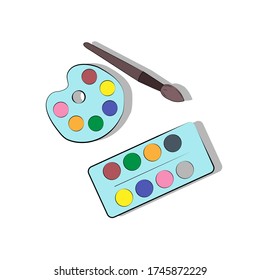 Palette with paints and brush to paint
