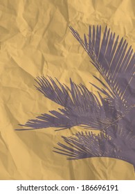 Palm leaf on yellow crumpled paper texture background - vintage illustration, eps10