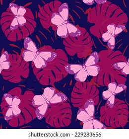 Palm leaf seamless pattern with butterflies.