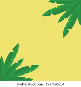 palm leaves on yellow background