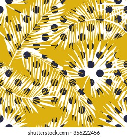 Palm leaves polka dots silhouettes on the yellow background. Vector seamless pattern with tropical plants. 