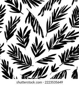 Palm leaves seamless pattern. Brush drawn palm branches silhouettes ornament. Sketch style tropical leaves drawn by brush. Abstract plant motif. Modern monochrome ornament. Vector botanical pattern.