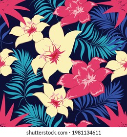 Palm leaves. Seamless pattern with leaves of tropical plants with white flowering flowers. Vector floral design.