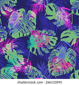 Palm leaves seamless vector background. Dark blue.