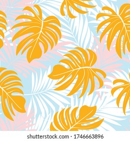 Palm leaves. Tropical seamless background pattern. Graphic design with amazing palm trees suitable for fabrics, packaging, covers