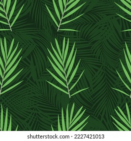 Palm leaves tropical seamless repeat pattern on dark green background