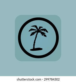 Palm on beach in circle, in square, on pale blue background