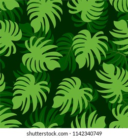 Palm. Seamless pattern from tropical plant leaves. Jungle. Vector wallpaper, background.