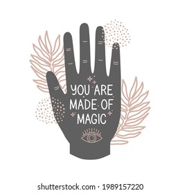 Palm silhouette, outline drawing. Mystical symbols. Stars, plant, and eye. Lettering you are made of magic. Hand-drawn poster design, boho style card, vector illustration. Inspirational quote.