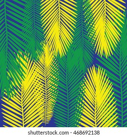 Palm tree leaves background in colors of the Brazilian flag.