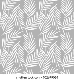 Palm tree leaves seamless pattern. Exotic leaves background. Vector illustration.