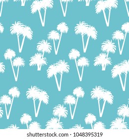 Palm trees isolated on blue background. Vector tropical seamless pattern.