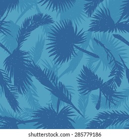 Palm trees leaves seamless pattern in cold hues. EPS10 vector illustration.