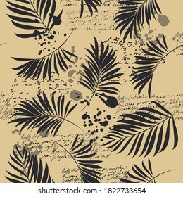 Palm trees. Seamless pattern with branches of tropical plants. Vector image.