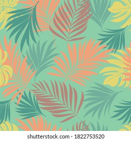 Palm trees. Seamless pattern with branches of tropical plants. Vector image.