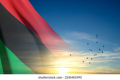 Pan-african Flag, Black Liberation Flag on background of sky. EPS10 vector