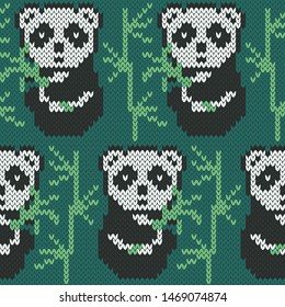 Panda bear and bamboo on green background. Jacquard knitted seamless pattern. Vector illustration.