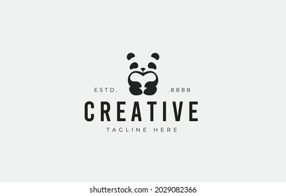 Panda Love Logo Design. Minimalist Panda Animal Holding Heart Negative Space Flat Art Icon Design Template 