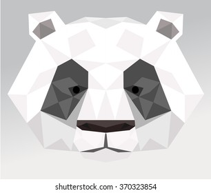 Panda. Made in low poly triangular style. Symmetrical vector illustration of a panda.