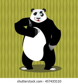 Panda thumb up and winks. Chinese bear all good.  Hand showing ok. Gesture of hands.  happy wild animal and background of bamboo. forest beast