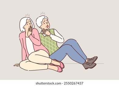 Panic among elderly people who fell to ground and screamed in fear caused by shocking information. Unhappy gray haired old men and women showing panic attack due to bad news or misinformation in media