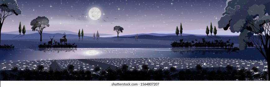 Panorama Landscape In Winter Night With Full Moon, Misty Covered Wavy Mountains And Reindeers Family Standing By The Lake, Beautiful Landscape View For Holiday Background