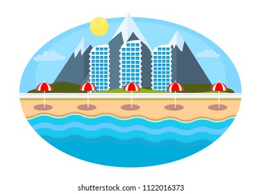 Panorama of a summer resort with a beach with umbrellas, mountains and hotels.