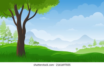 
Panorama view of spring green meadow with hills and blue sky