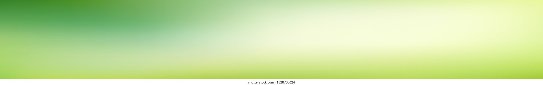 Panoramic abstract green blurred gradient background.  Horizontal view for a glass panels - skinali. Trendy modern nature backdrop. Ecology concept for your graphic design. 