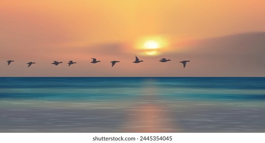 Panoramic landscape at setting sun, showing a flight of migratory birds over the ocean.