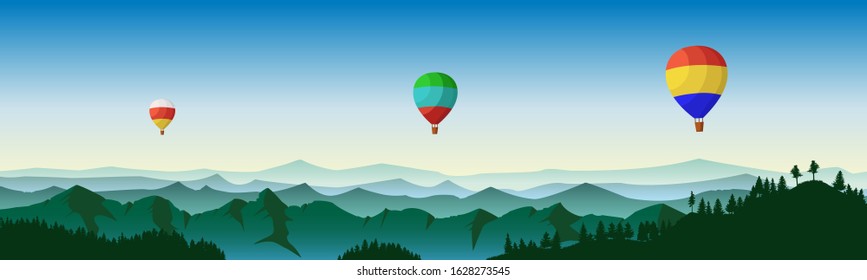 Panoramic mountain view with balloons.