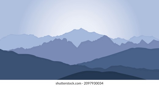 panoramic view of the mountain landscape with fog in the valley below with the alpenglow sky