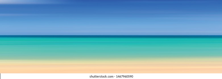 Panoramic view of the sandy beach of the sea, blurred summer background. Blue sky, sea and yellow sand.