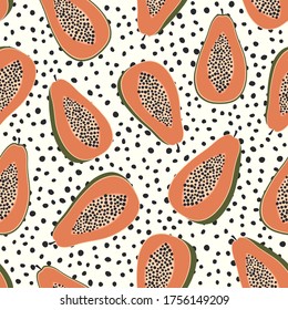 El papaya produce un patrón impecable con un fondo de puntos. Frutas tropicales