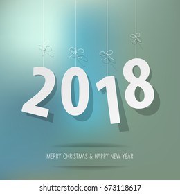 paper 2018 digits on blue bokeh background