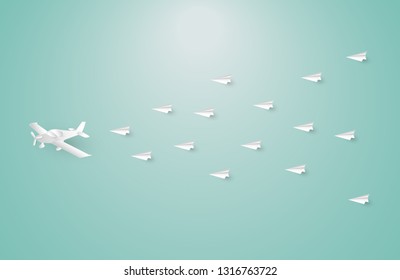 Paper airplane among white origami airplanes, leadership, teamwork, motivation, stand out of the crowd concept, vector eps10 illustration.