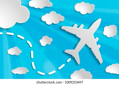 paper airplane with paper clouds and light beams with sun rays on a blue background