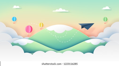 Paper airplane and hot air ballons flying on mountains,clouds and beautiful sky paper art style.Vector illustration.