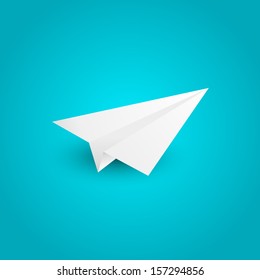 Paper airplane on blue background