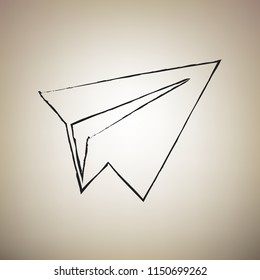Paper airplane sign. Vector. Brush drawed black icon at light brown background.