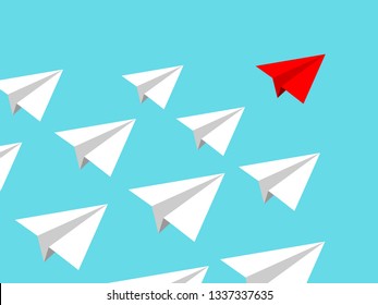 Paper airplane team with red leader conducting mission isolated on blue clear sky. Teamworking concept