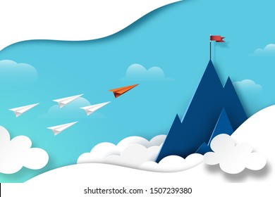 Paper airplane teamwork flying to red flag on the top of mountain.Business leadership and success concept paper art style.Vector illustration.